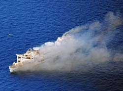 Smokey aerial view of the anchored Gen. Hoyt S. Vandenberg